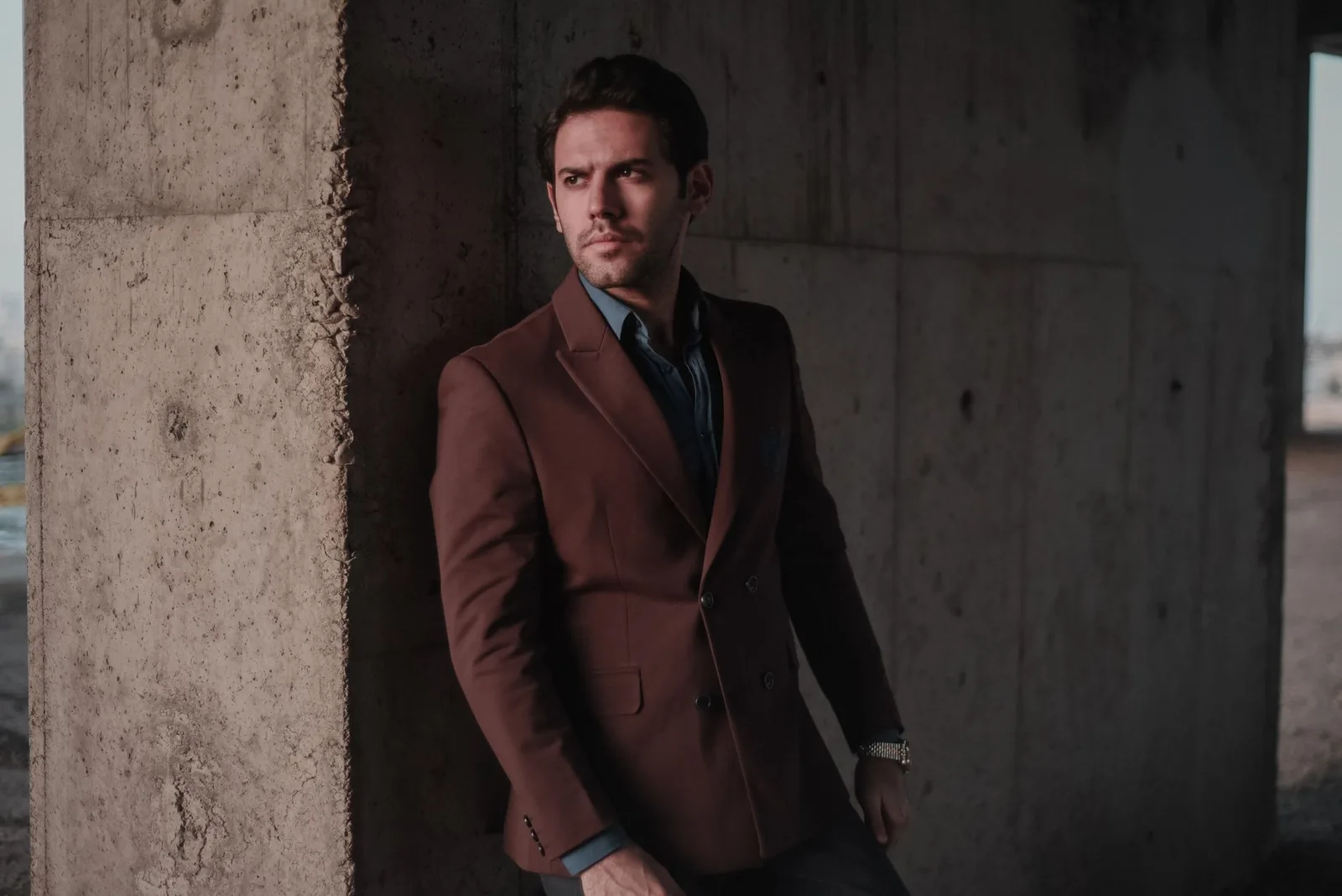 A smart casual outfit combining a jacket with relaxed trousers