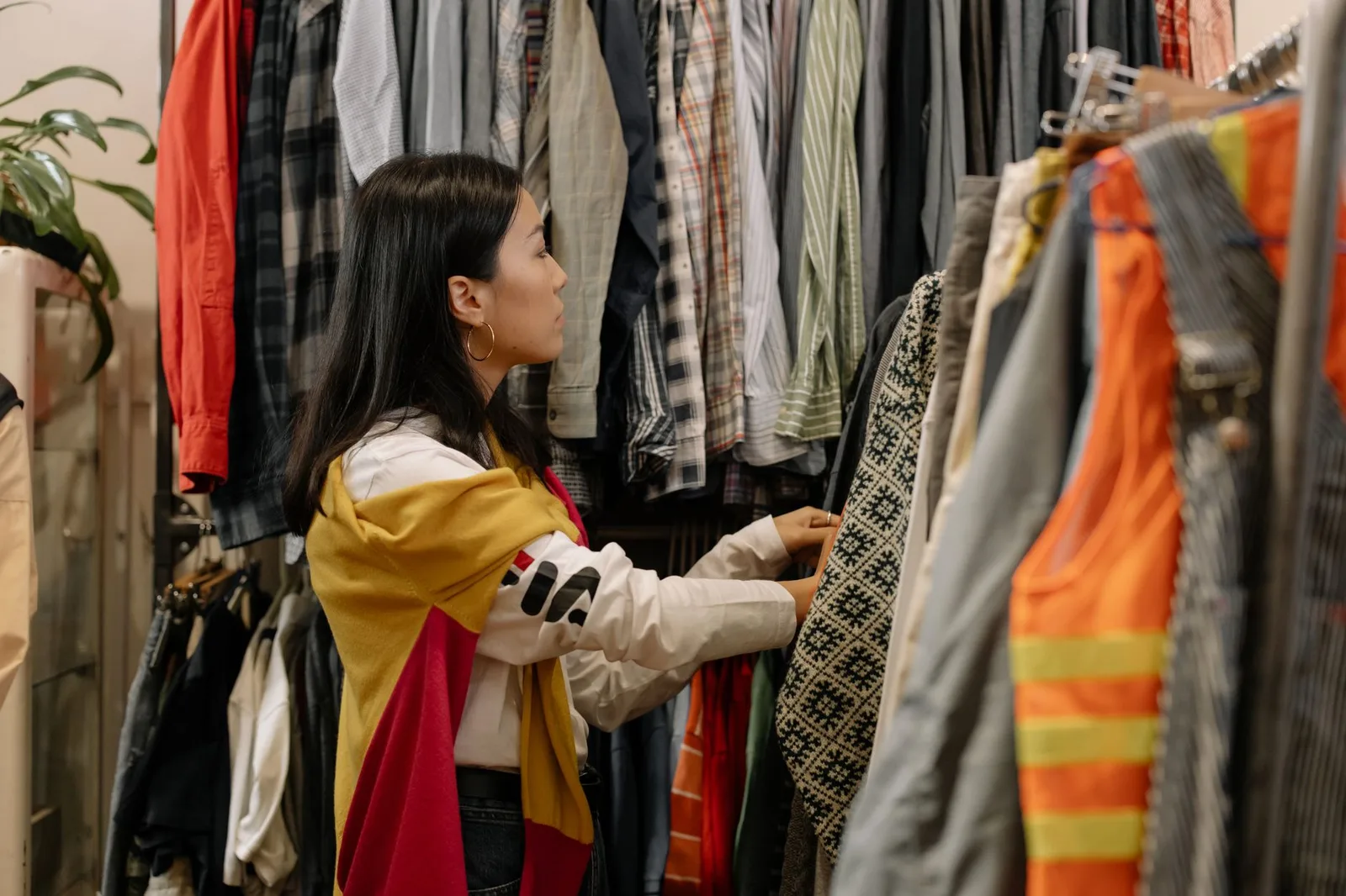 A rack of secondhand clothing in a thrift store