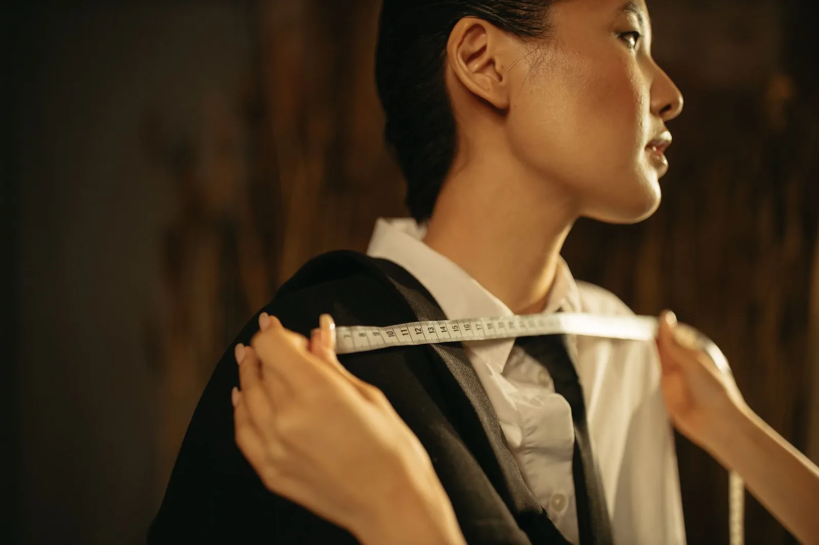 The shoulder of a structured jacket showing a defined seam line