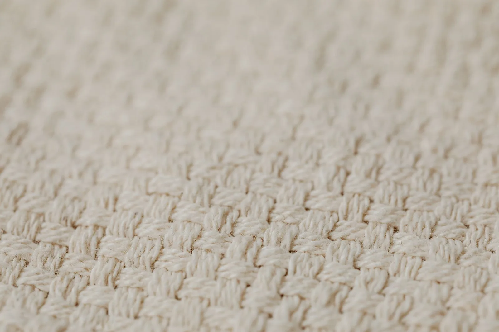 Close-up of cotton jersey fabric showing the knit structure